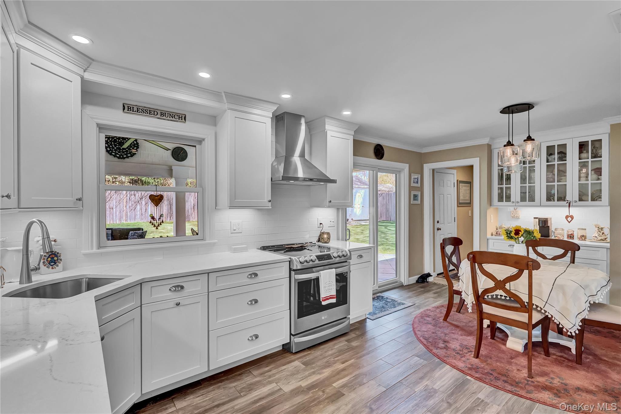171 Prince Road Rocky Point, NY 11778 - Photo 16 of 35 Dining area offer beautiful custom built-in for coffee bar/wine bar