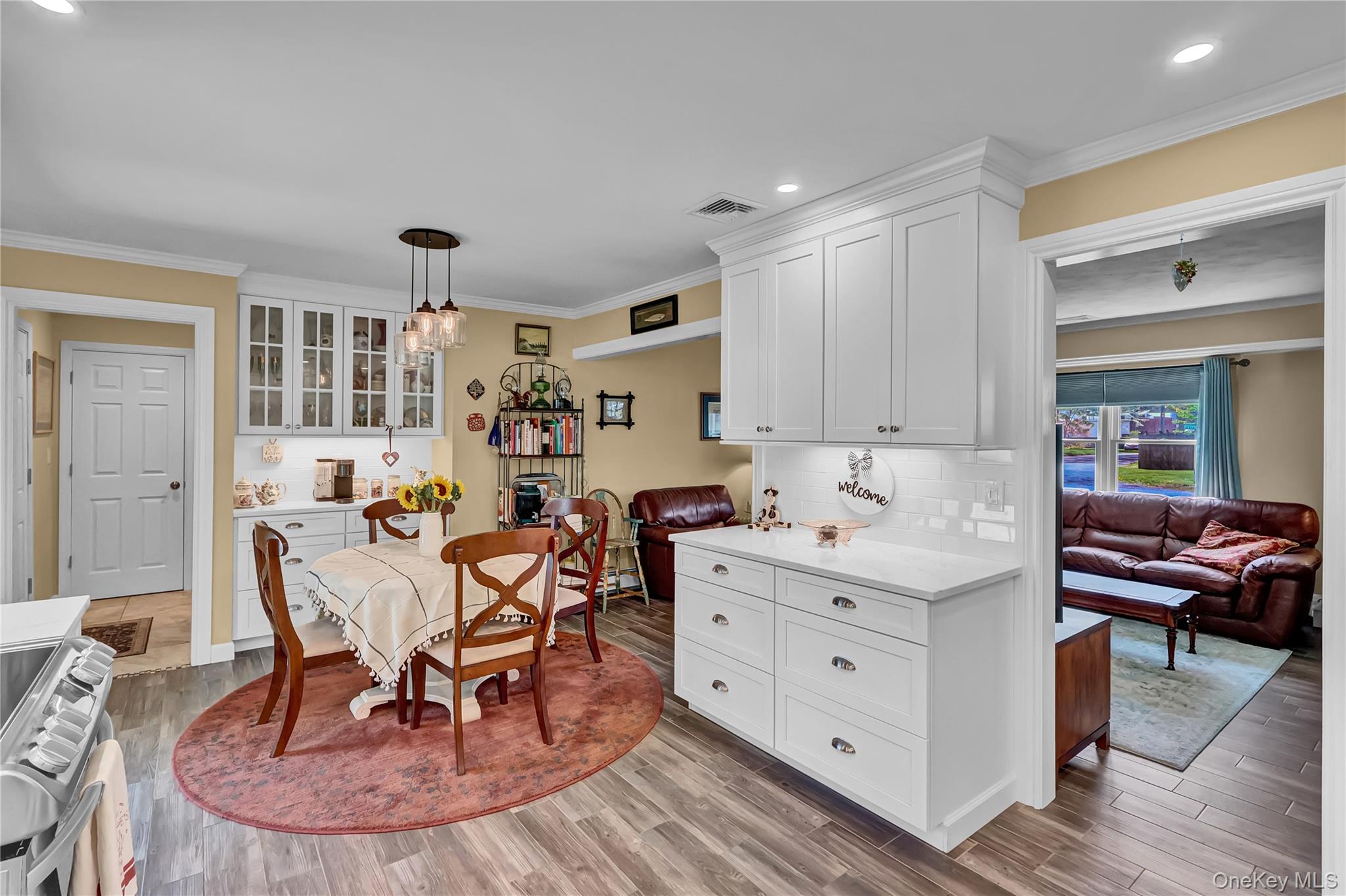 171 Prince Road Rocky Point, NY 11778 - Photo 18 of 35 The gorgeous wood look tile flows from the living room to the kitchen
