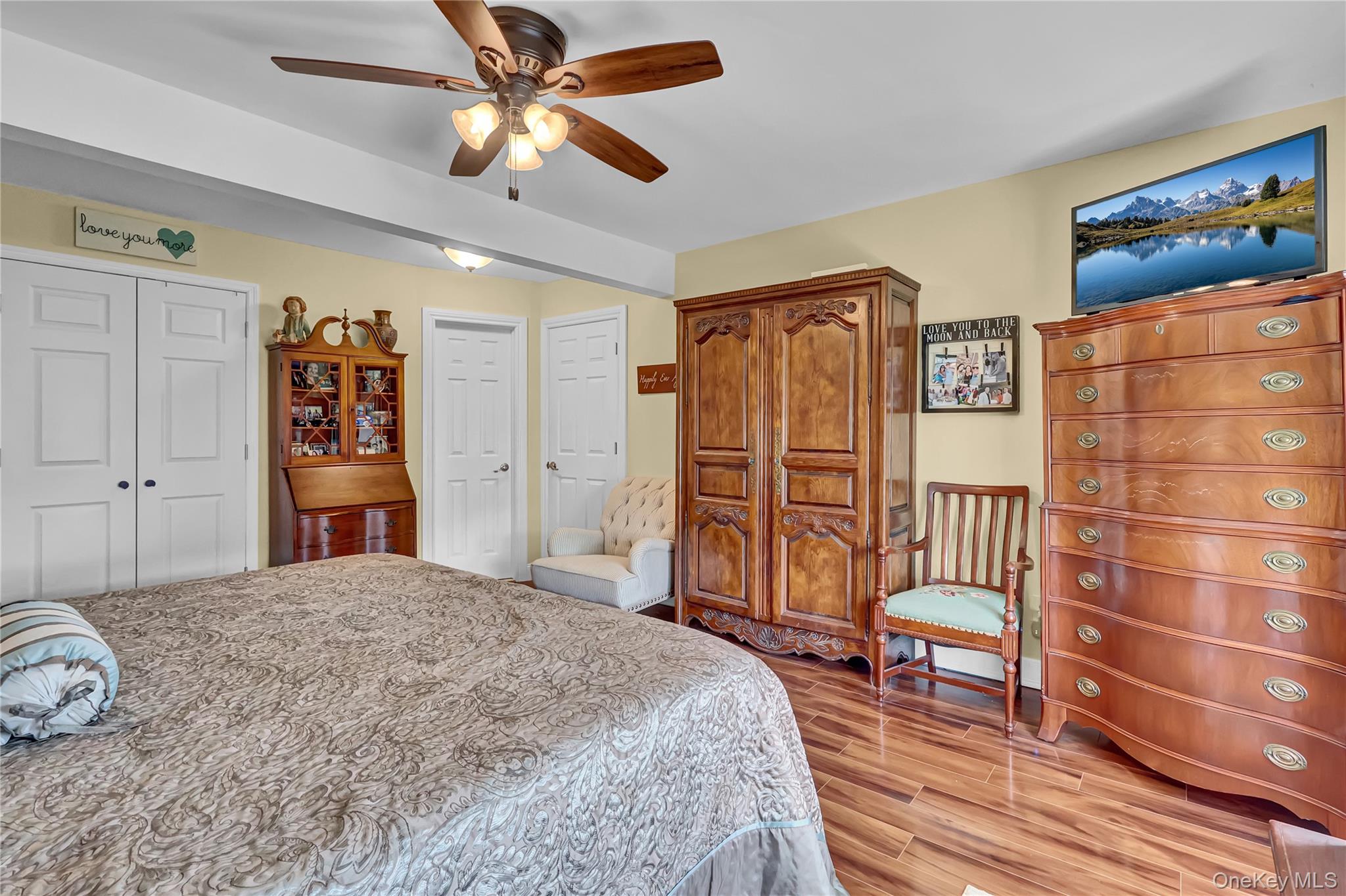 171 Prince Road Rocky Point, NY 11778 - Photo 20 of 35 First floor primary bedroom is spacious and offers beautiful hardwood flooring