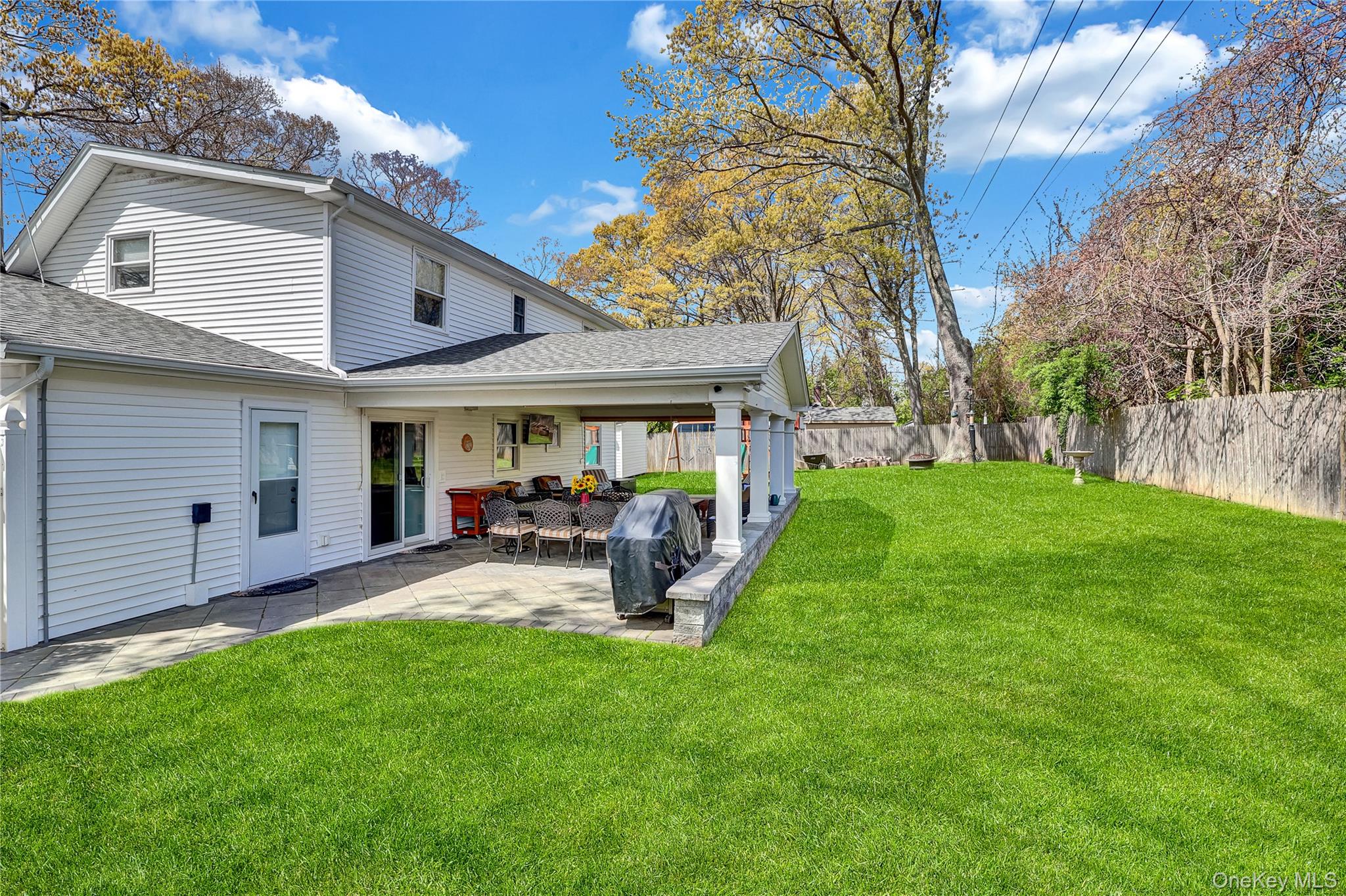 171 Prince Road Rocky Point, NY 11778 - Photo 6 of 35 Rear property, fully fenced, beautiful flat lot
