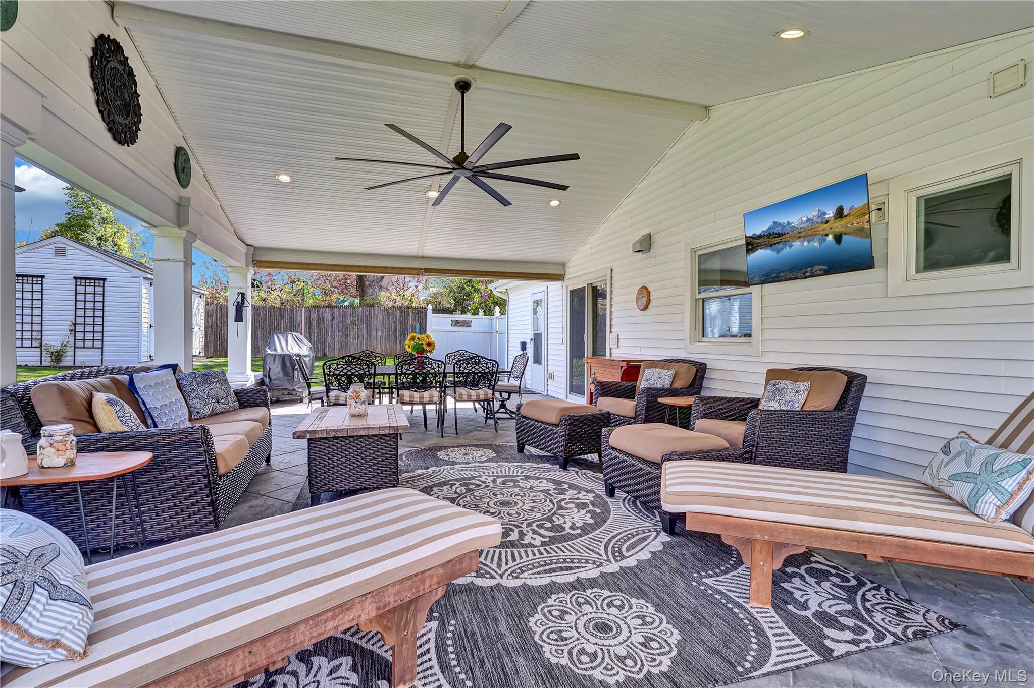171 Prince Road Rocky Point, NY 11778 - Photo 7 of 35 Enjoy relaxing under the large covered patio