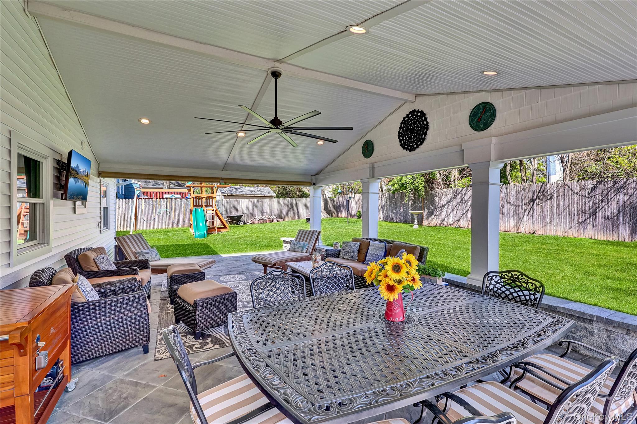 171 Prince Road Rocky Point, NY 11778 - Photo 8 of 35 Covered patio, perfect for outdoor entertaining