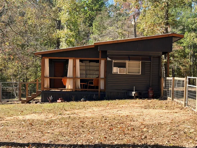 a view of a house with swimming pool