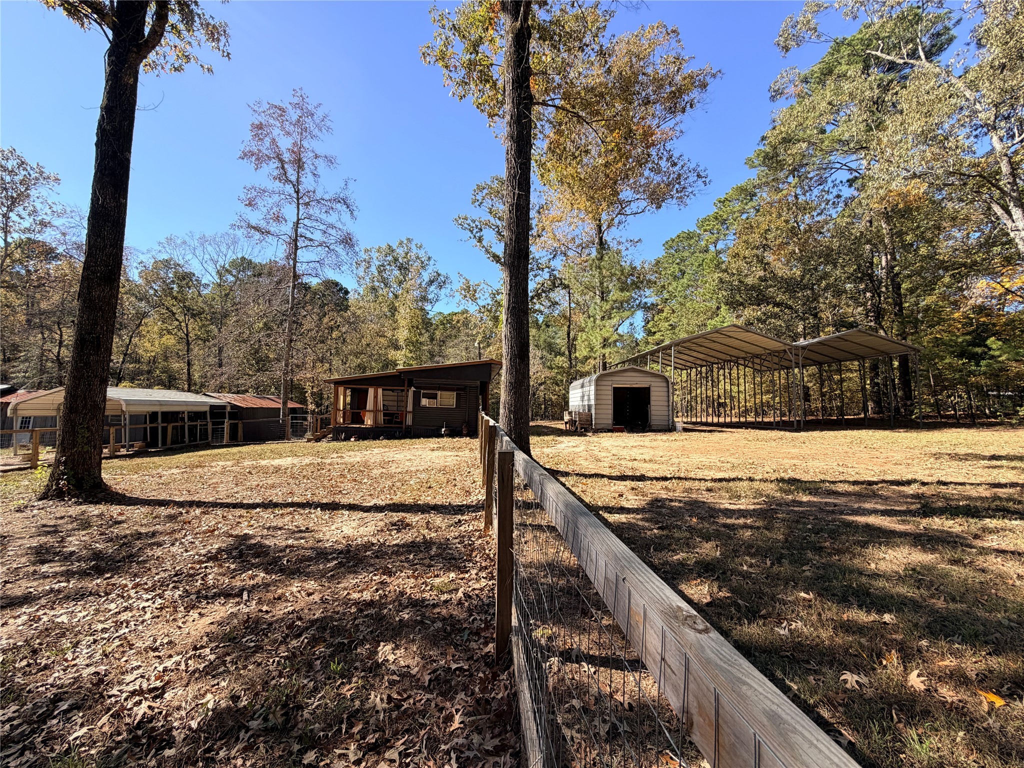 171 County Road 421 Bronson, TX 75930 - Photo 15 of 49 a view of a house with swimming pool