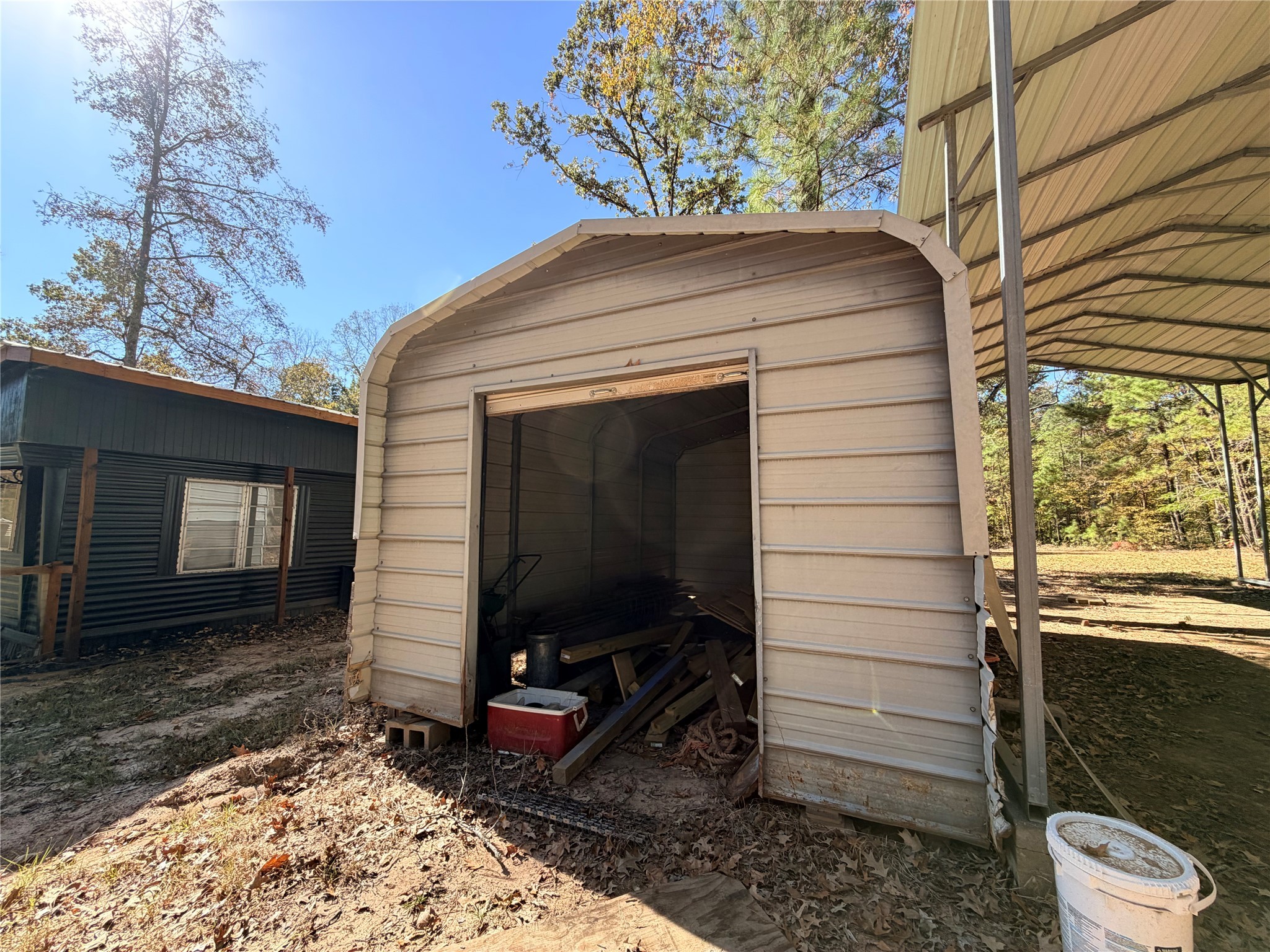 171 County Road 421 Bronson, TX 75930 - Photo 19 of 49 a front view of a house with garden