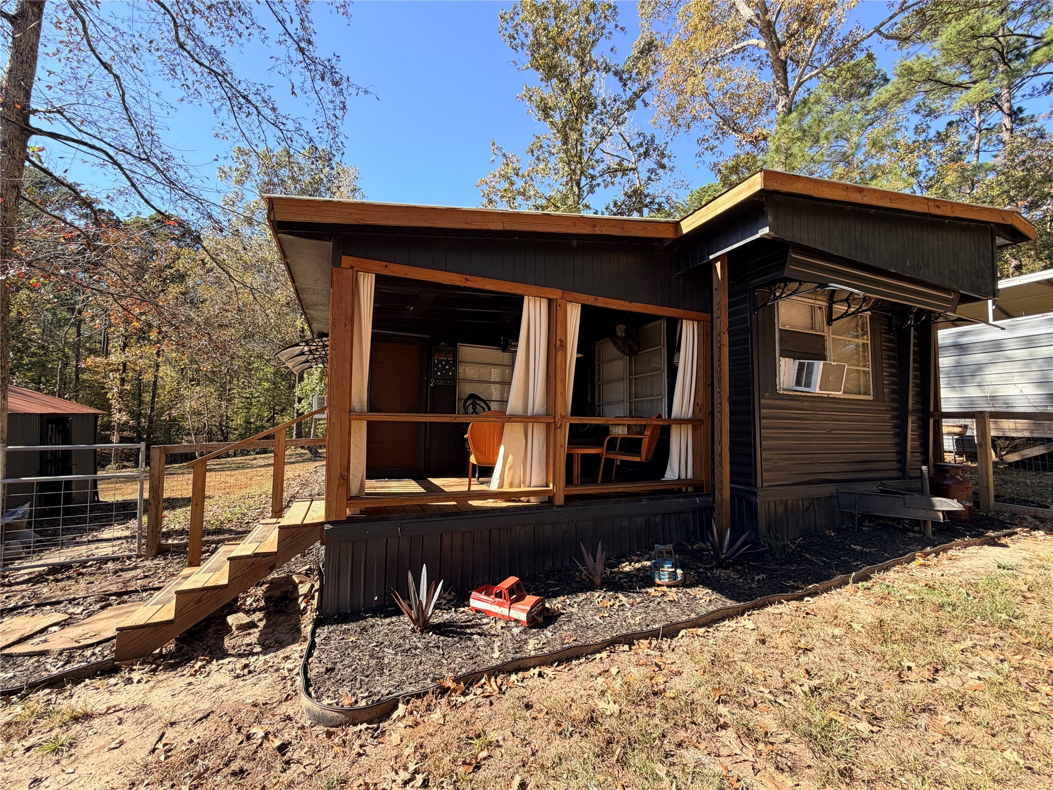 171 County Road 421 Bronson, TX 75930 - Photo 22 of 49 a front view of a house