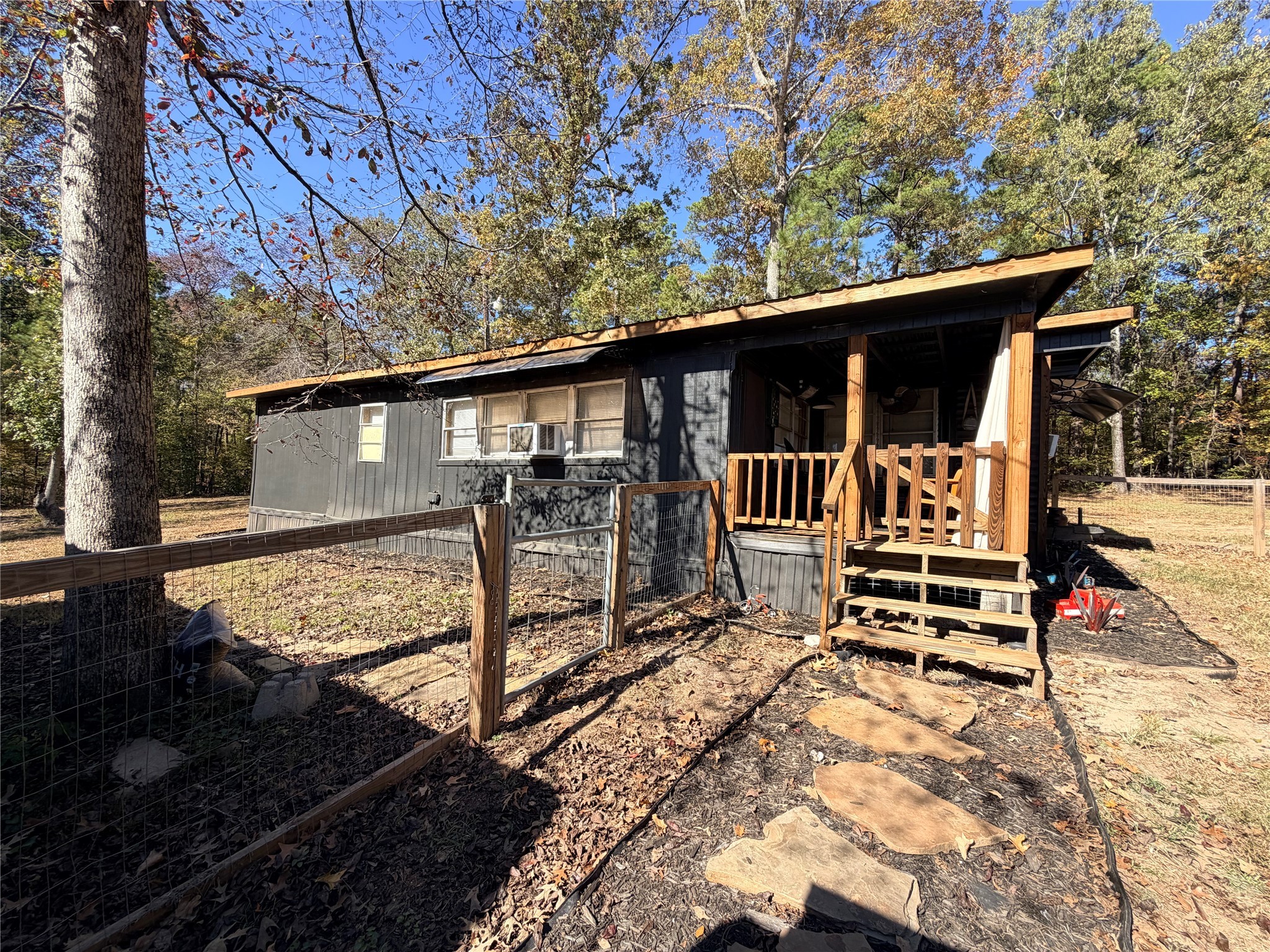 171 County Road 421 Bronson, TX 75930 - Photo 23 of 49 a house view with a outdoor space