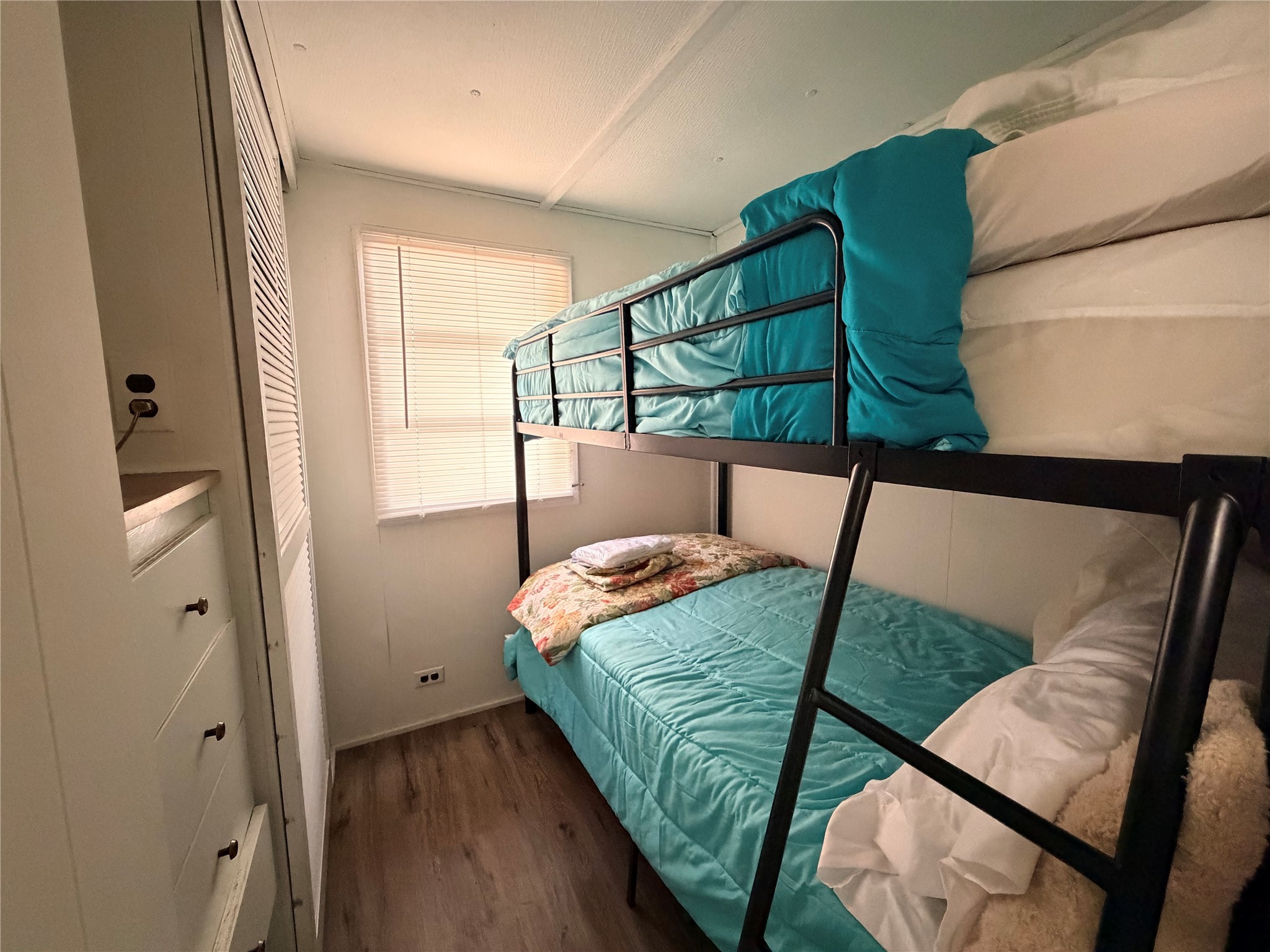 171 County Road 421 Bronson, TX 75930 - Photo 33 of 49 a bedroom with a bed and a window