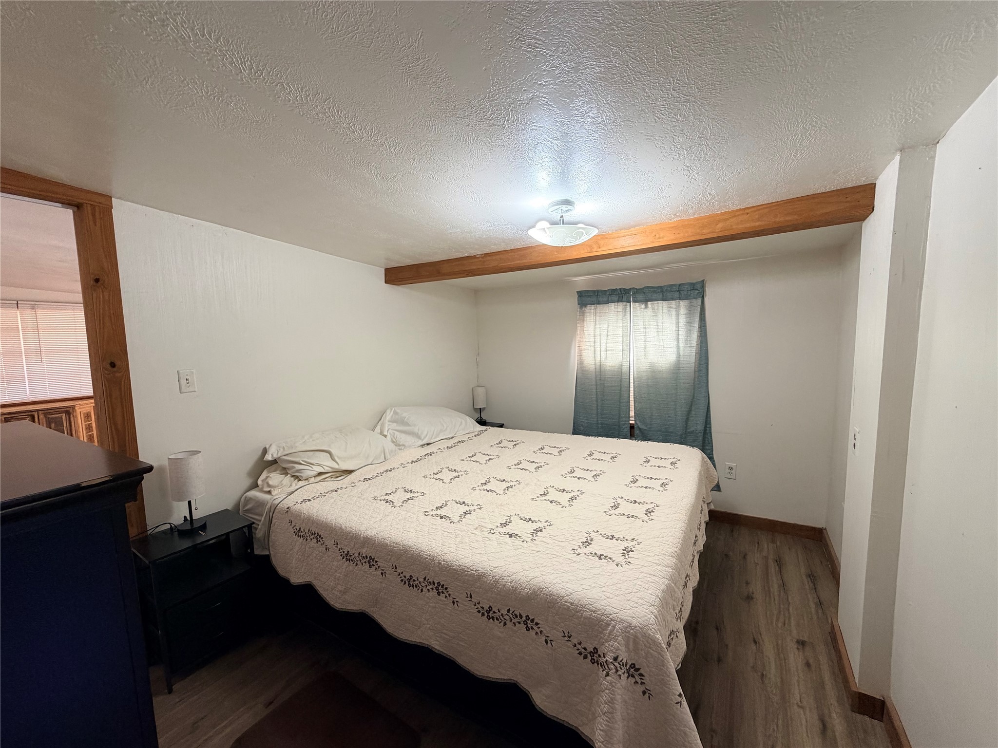 171 County Road 421 Bronson, TX 75930 - Photo 35 of 49 a bedroom with a bed and a window