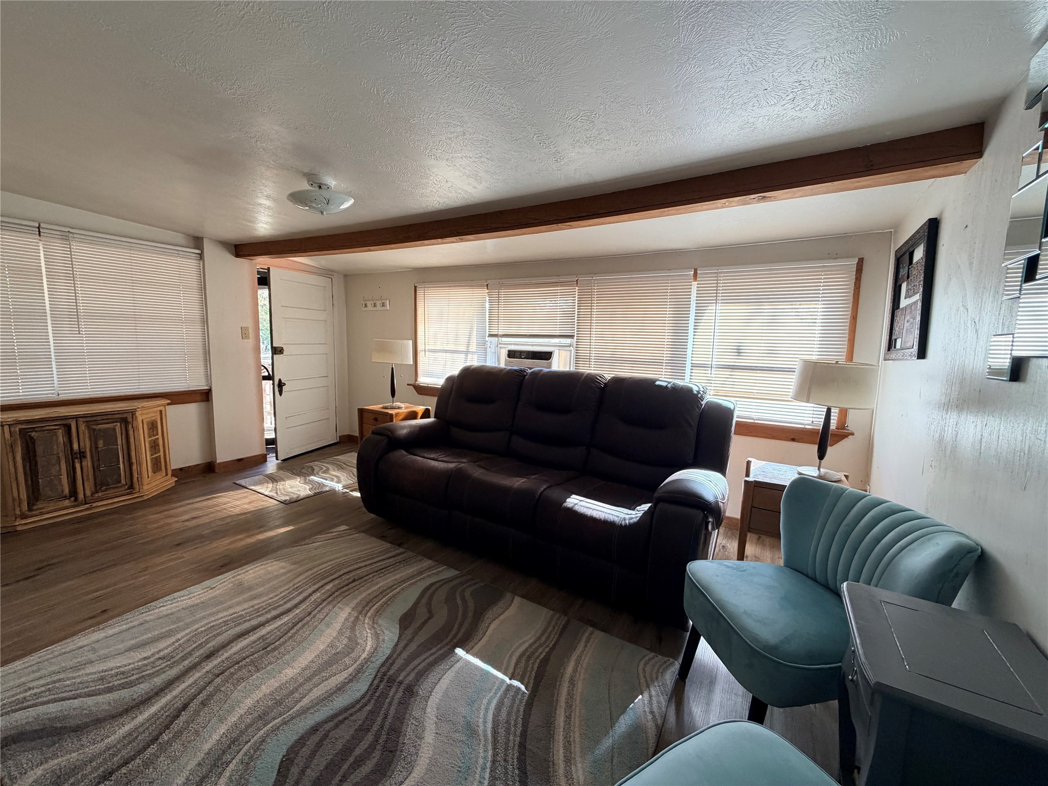 171 County Road 421 Bronson, TX 75930 - Photo 41 of 49 a living room with furniture and a wooden floor