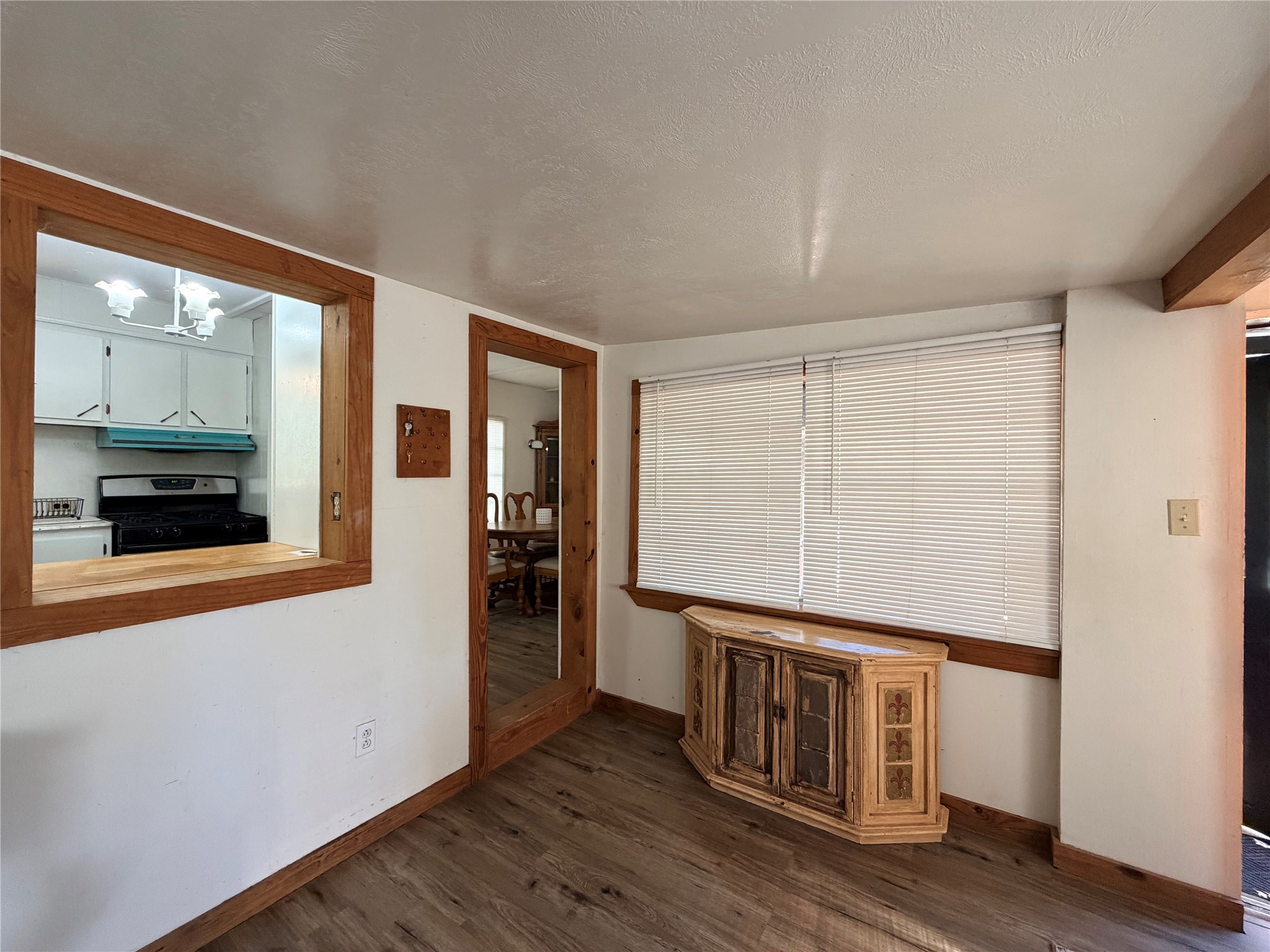 171 County Road 421 Bronson, TX 75930 - Photo 42 of 49 a view of an empty room with wooden floor and a window