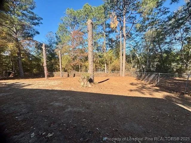a view of yard with trees