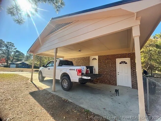 a view of a car in front of a building