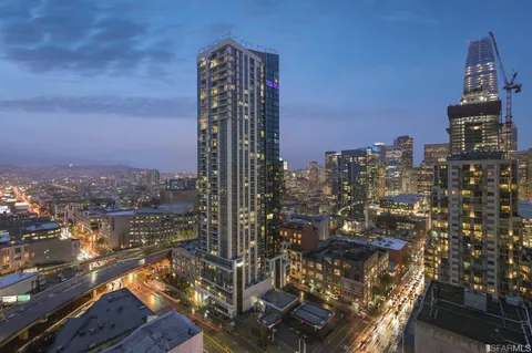 a view of a city with tall buildings