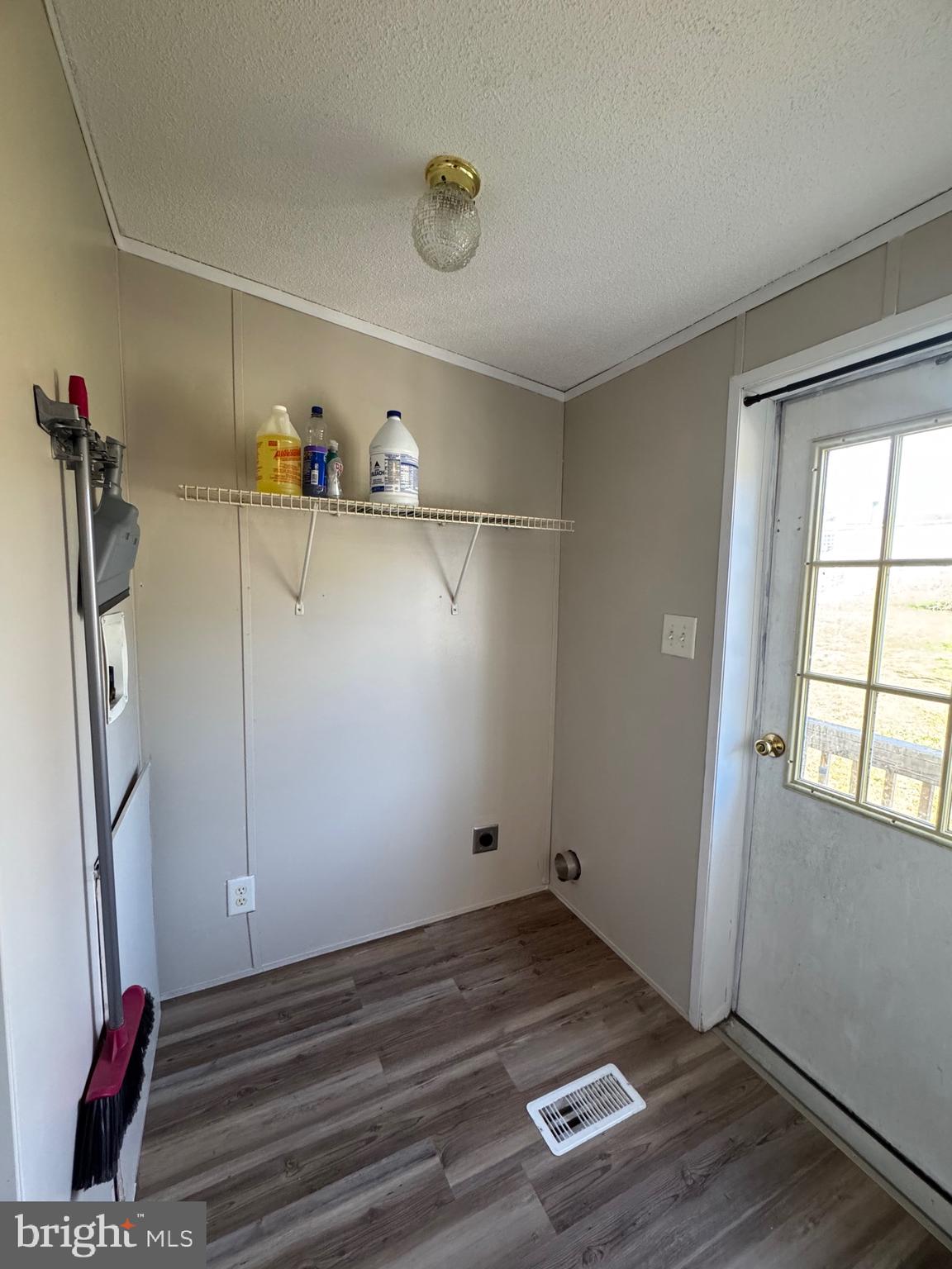 701 Cassel Road, Unit 105 Manchester, PA 17345 - Photo 14 of 35 a view of empty room with wooden floor and fan