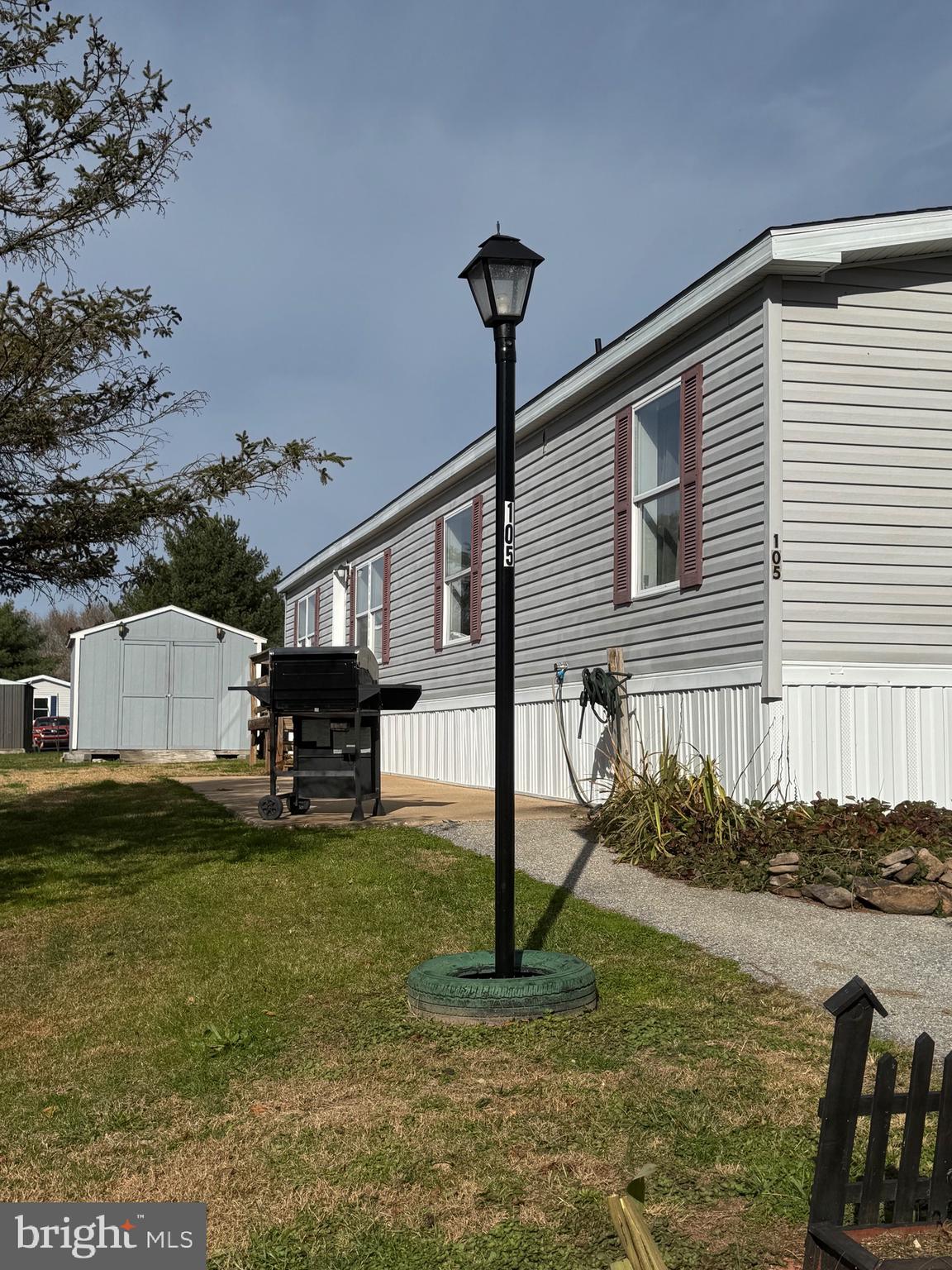 701 Cassel Road, Unit 105 Manchester, PA 17345 - Photo 2 of 35 a view of a house with backyard and sitting area