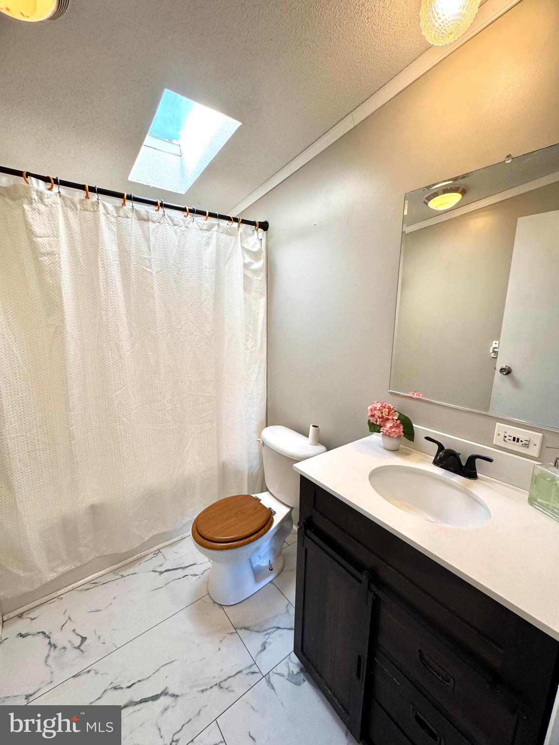 701 Cassel Road, Unit 105 Manchester, PA 17345 - Photo 25 of 35 a bathroom with a sink and a mirror
