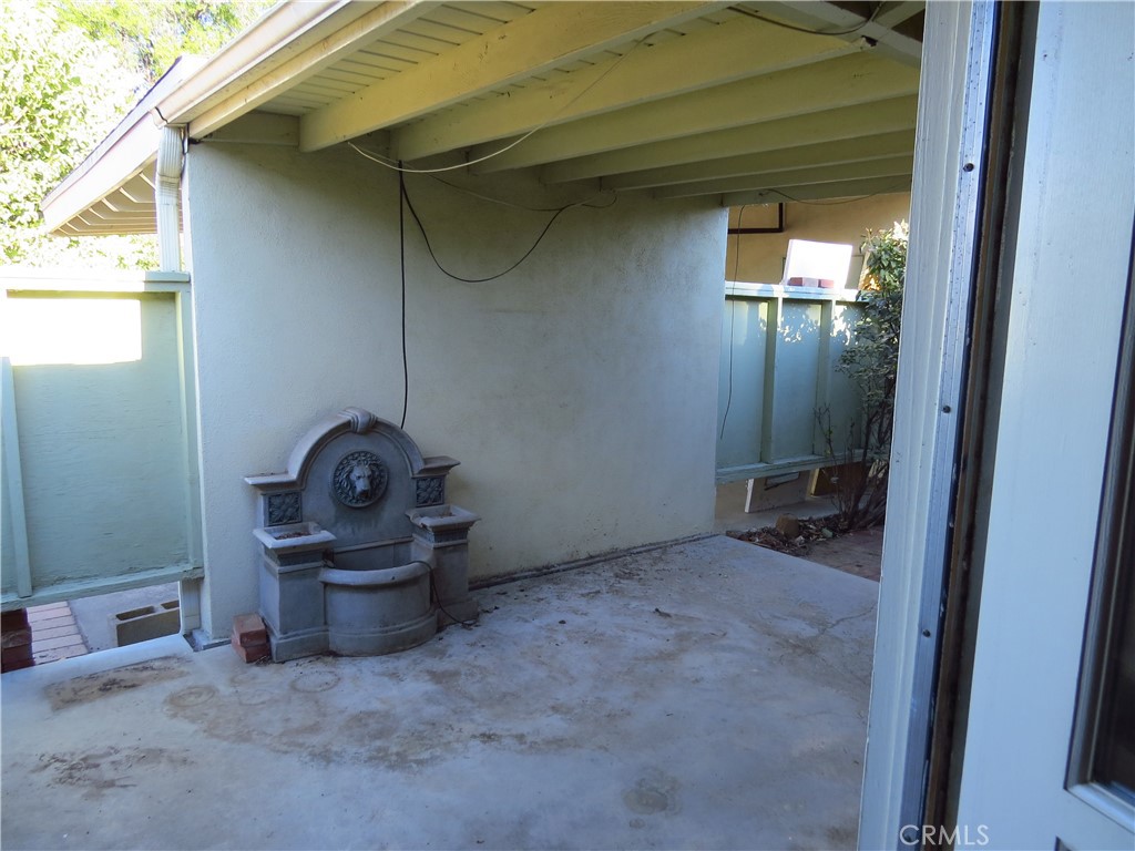 8159 Tunney Avenue Reseda, CA 91335 - Photo 19 of 33 a room with furniture and a window