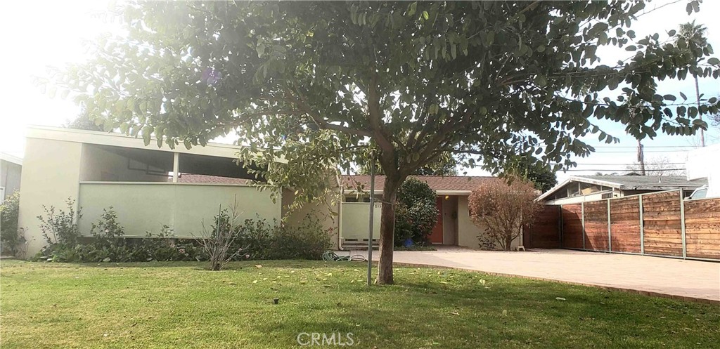 8159 Tunney Avenue Reseda, CA 91335 - Photo 2 of 33 a backyard of a house with lots of green space