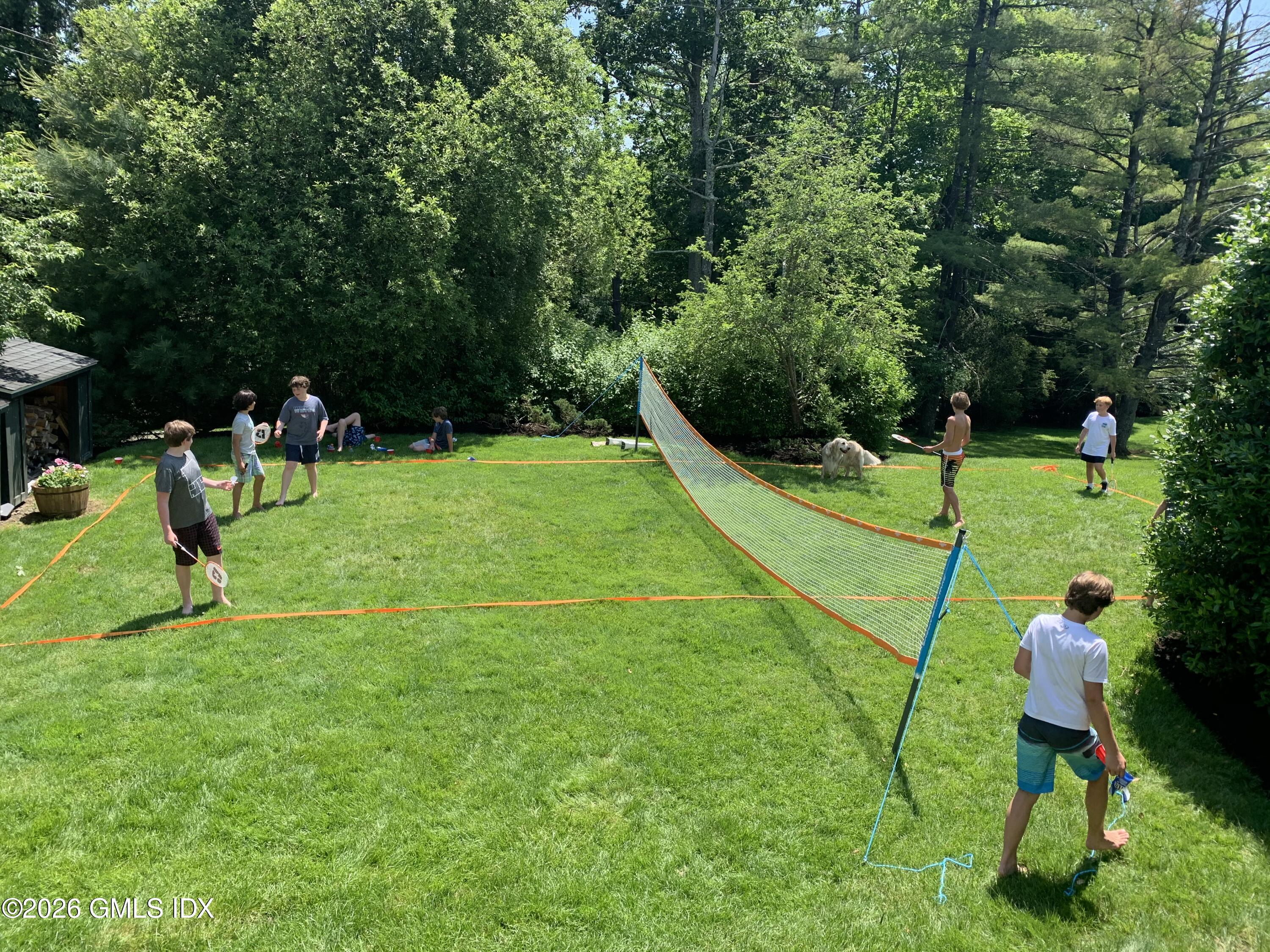 174 Round Hill Road Greenwich, CT 06831 - Photo 29 of 34 Playing Badminton