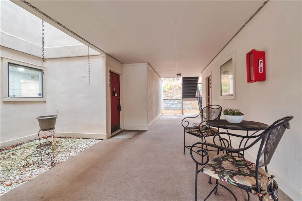 1502 Huntingdon Chase Atlanta, GA 30350 - Photo 25 of 29 a view of a livingroom with furniture and staircase