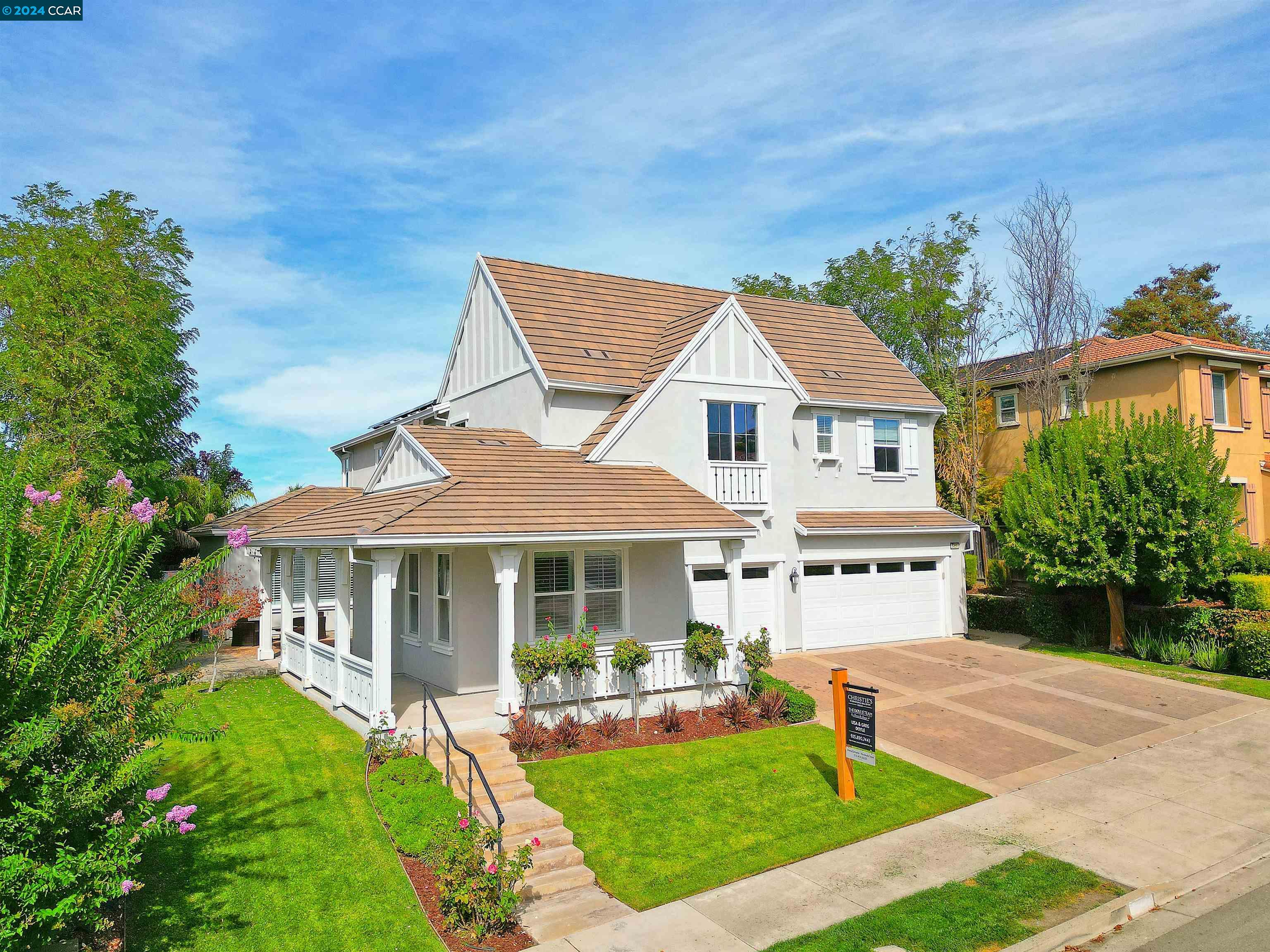 5458 Sherwood Way San Ramon, CA 94582 - Photo 1 of 1 a front view of a house with a yard table and chairs