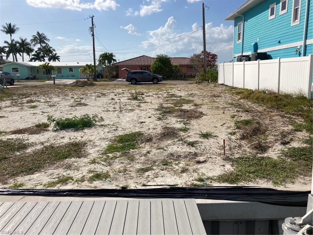 2849 Triggerfish Street Matlacha, FL 33993 - Photo 2 of 12 a view of a back yard of the house