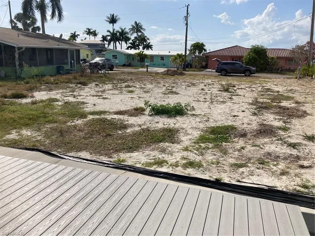 a view of a wooden floor on a terrace