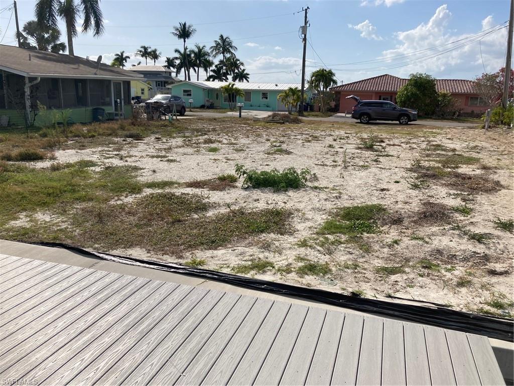 2849 Triggerfish Street Matlacha, FL 33993 - Photo 3 of 12 a view of a wooden floor on a terrace