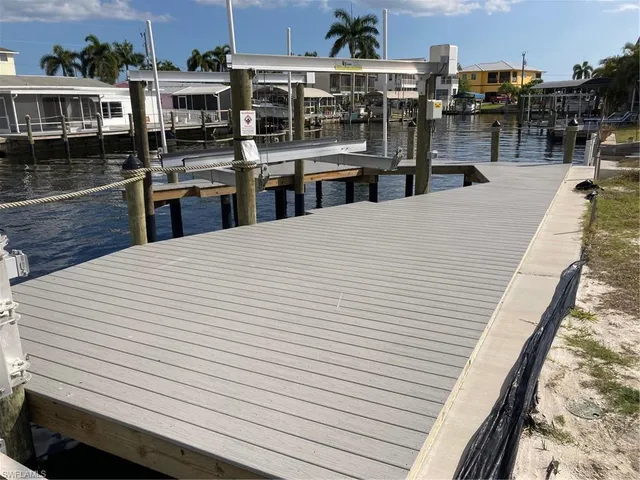 a large white building with wooden floor