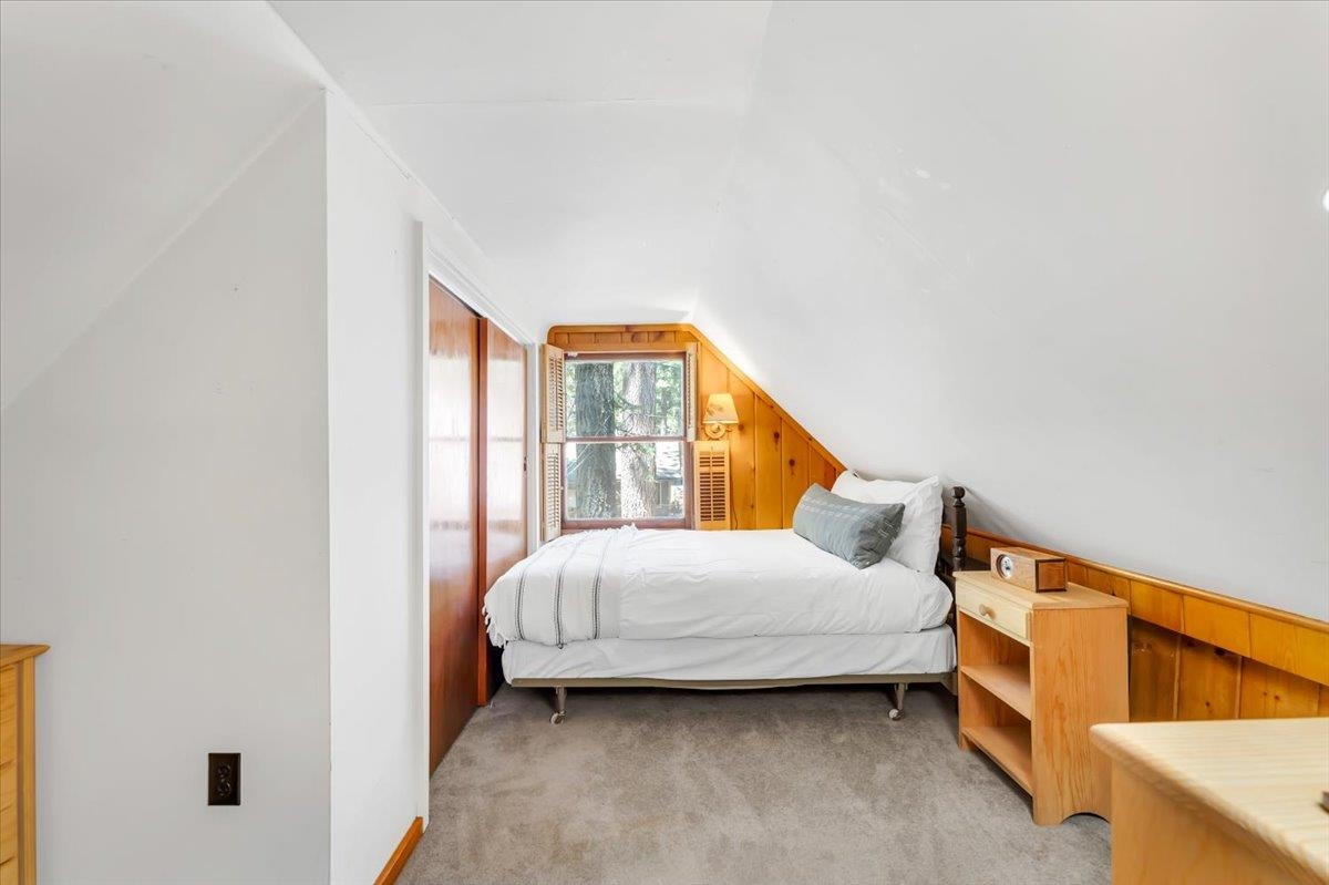 7230 3rd Avenue Tahoma, CA 96142 - Photo 12 of 20 a bedroom with a bed and a window