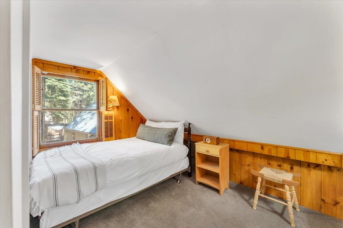 7230 3rd Avenue Tahoma, CA 96142 - Photo 13 of 20 a bedroom with a bed and a window