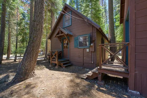 a house with trees in the background