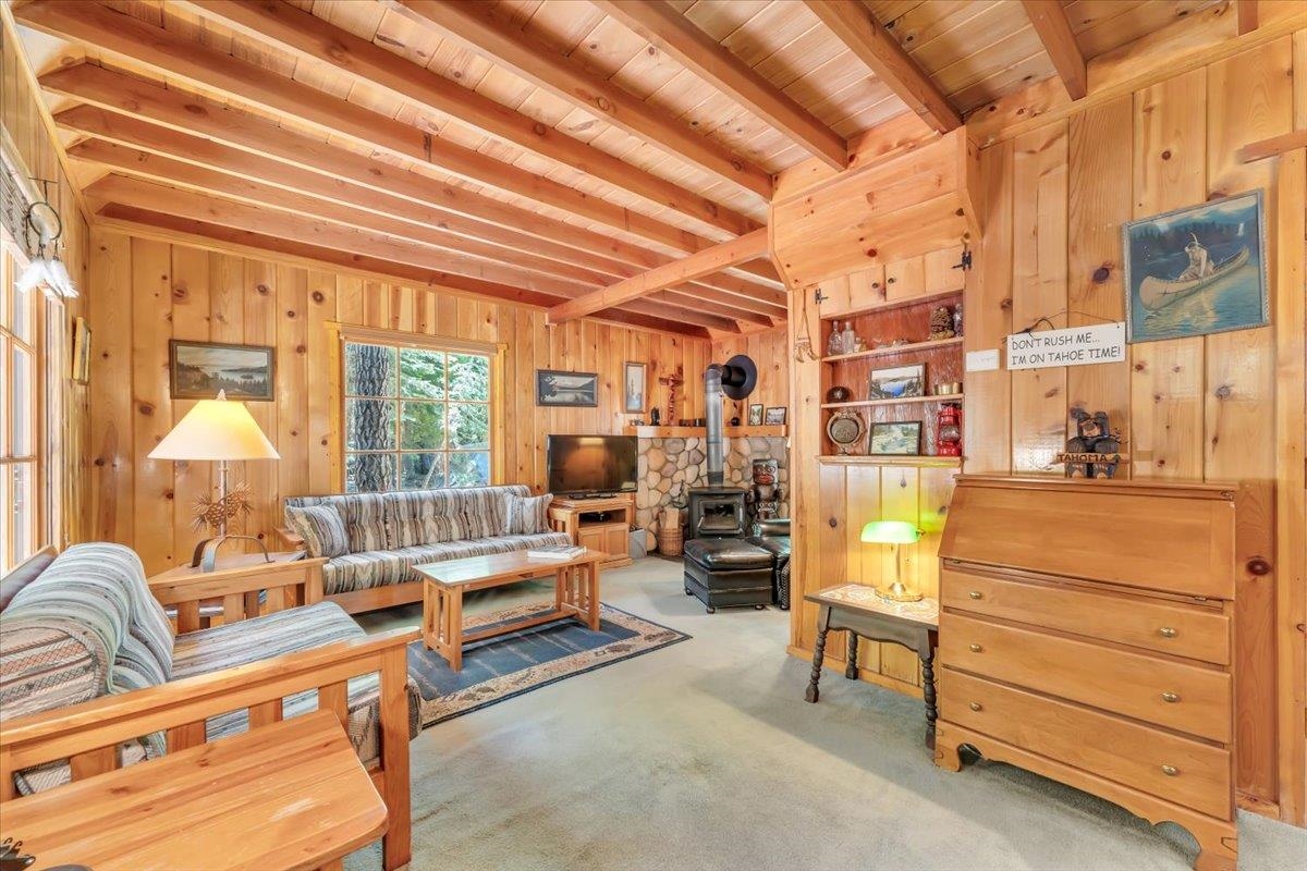 7230 3rd Avenue Tahoma, CA 96142 - Photo 3 of 20 a living room with furniture and a large window