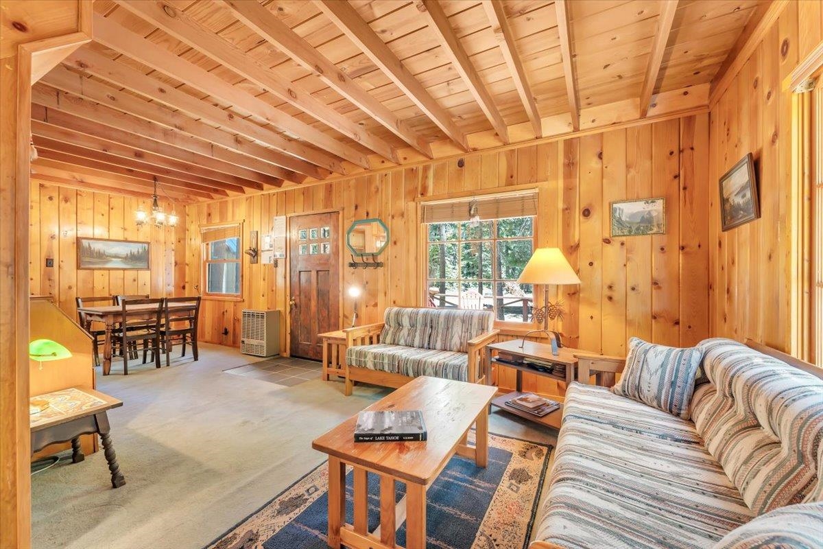 7230 3rd Avenue Tahoma, CA 96142 - Photo 5 of 20 a living room with furniture and a large window