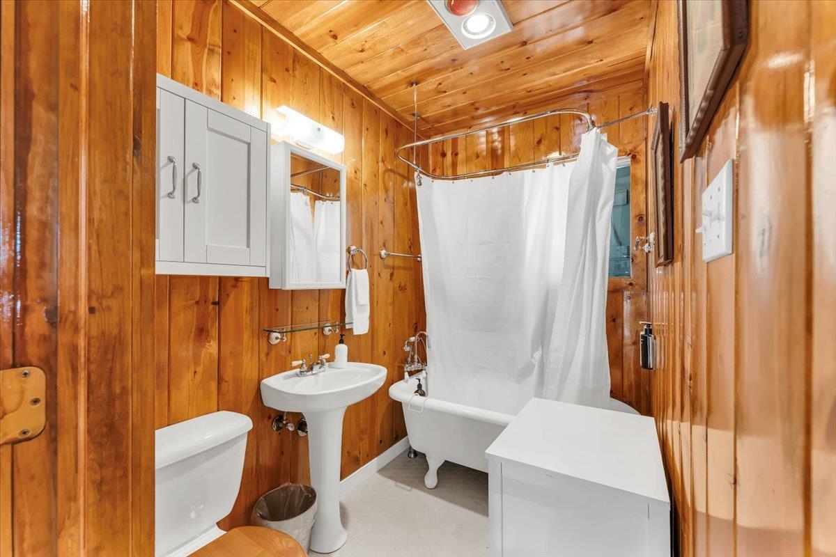 7230 3rd Avenue Tahoma, CA 96142 - Photo 9 of 20 a bathroom with a sink toilet and shower
