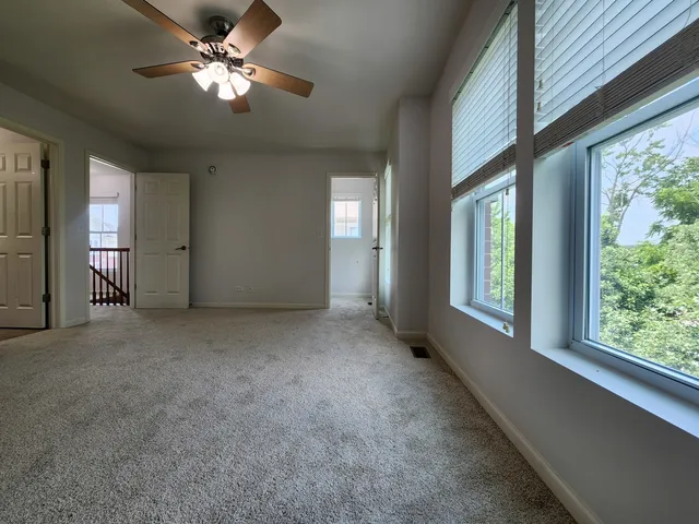 a view of empty room with a window