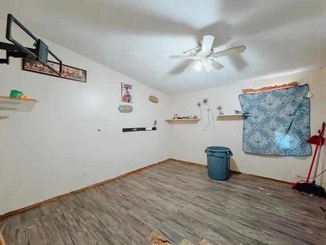 a bedroom with a bed and cabinets