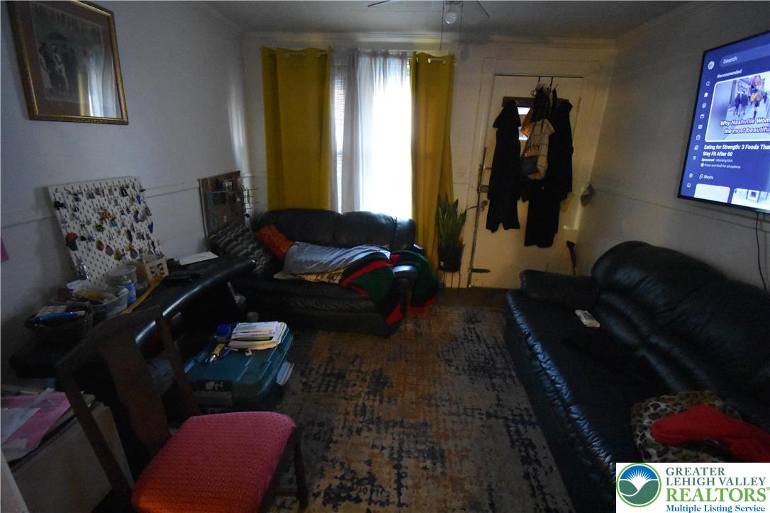 22 South Raspberry Street Easton, PA 18042 - Photo 2 of 16 a living room with furniture and a window