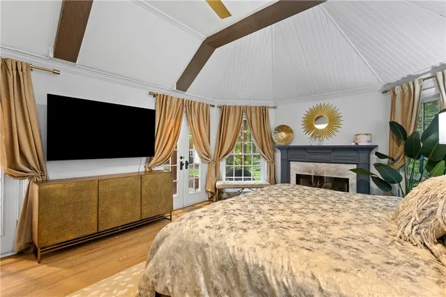 a view of a patio with a table and chairs