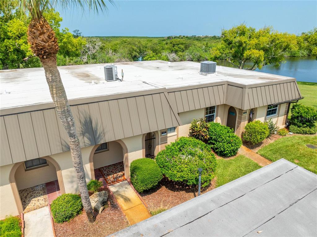 4112 Hampton Drive New Port Richey, FL 34652 - Photo 35 of 73 a view of a backyard with sitting area