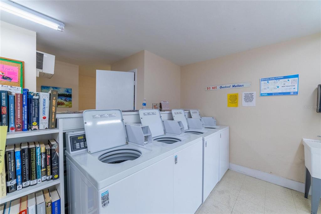 4112 Hampton Drive New Port Richey, FL 34652 - Photo 57 of 73 a utility room with washer and dryer