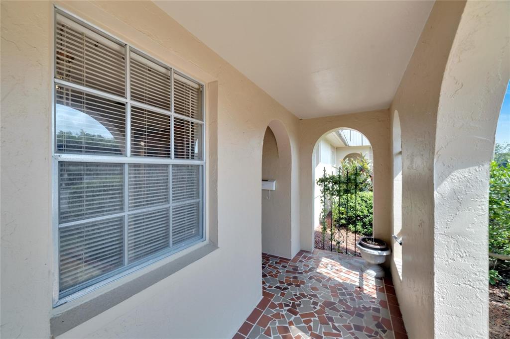 4112 Hampton Drive New Port Richey, FL 34652 - Photo 7 of 73 a view of house with a window and wooden floor