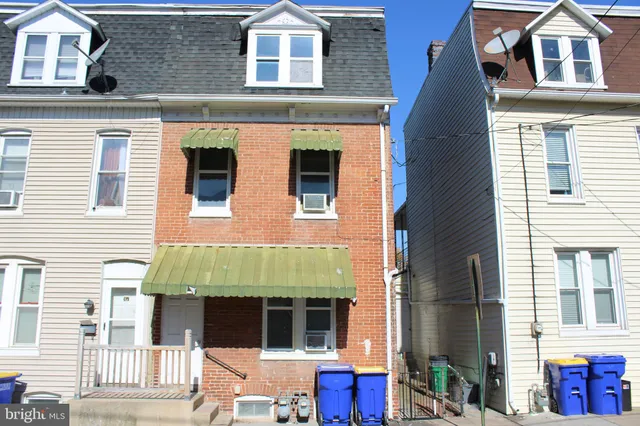 a front view of residential houses