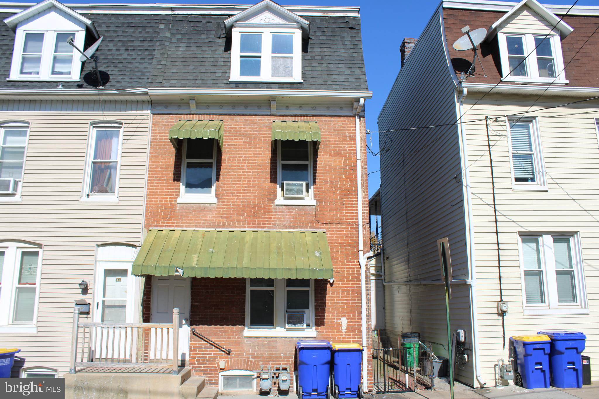 103 West 6th Avenue York, PA 17404 - Photo 1 of 19 a front view of residential houses