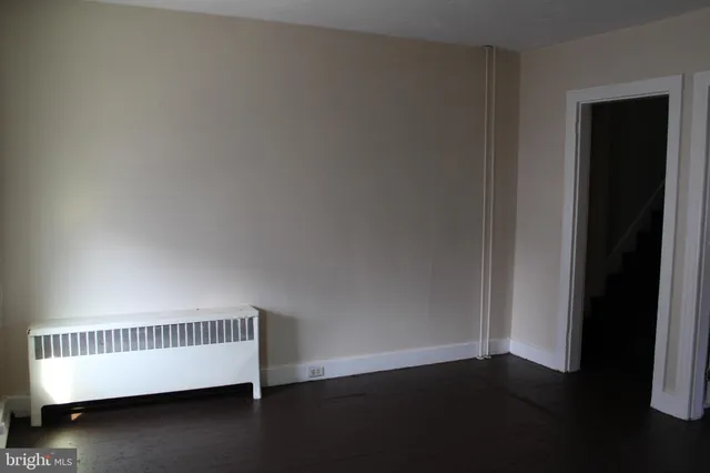 a view of a hallway with staircase