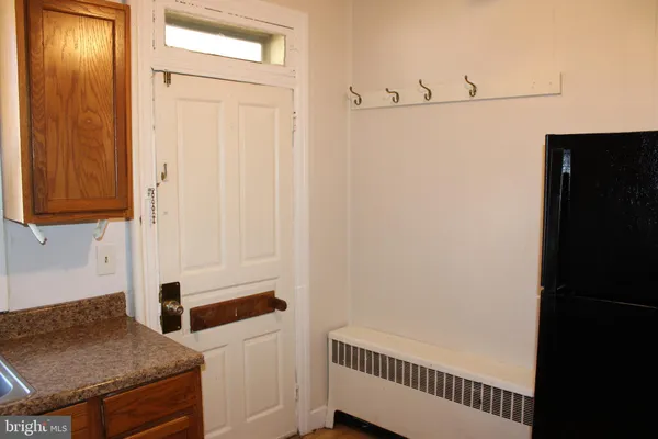 a view of a hallway with entryway