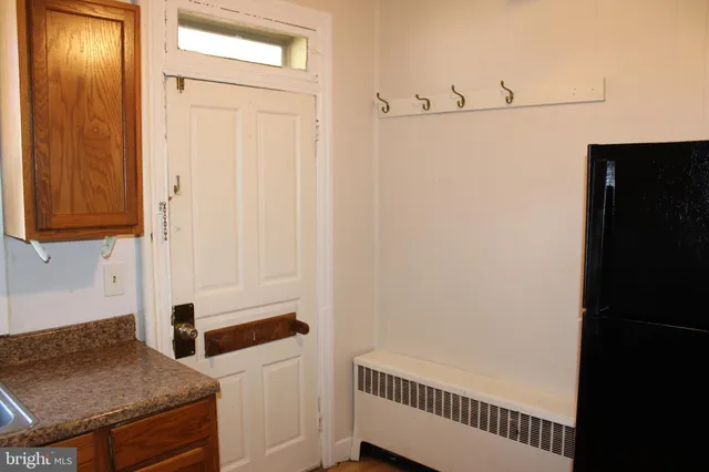 a view of a hallway with entryway