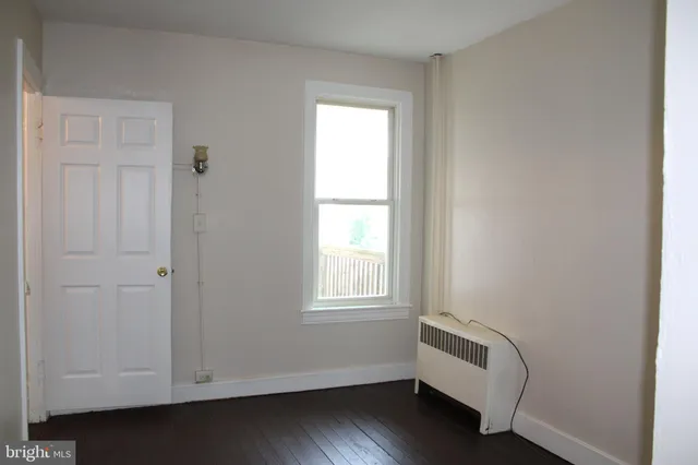 a room with window and closet