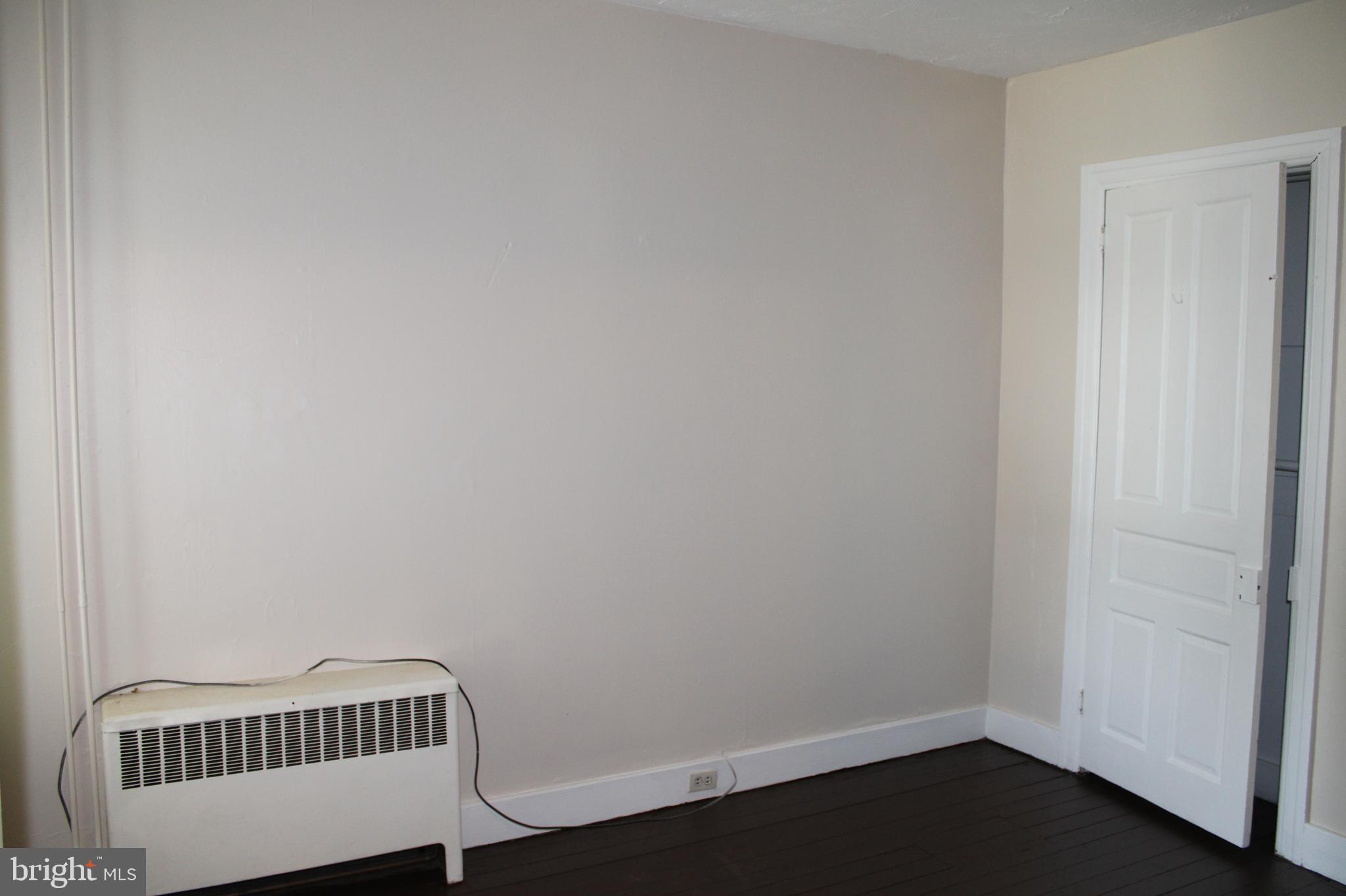 103 West 6th Avenue York, PA 17404 - Photo 5 of 19 a view of a room with wooden floor and a sink